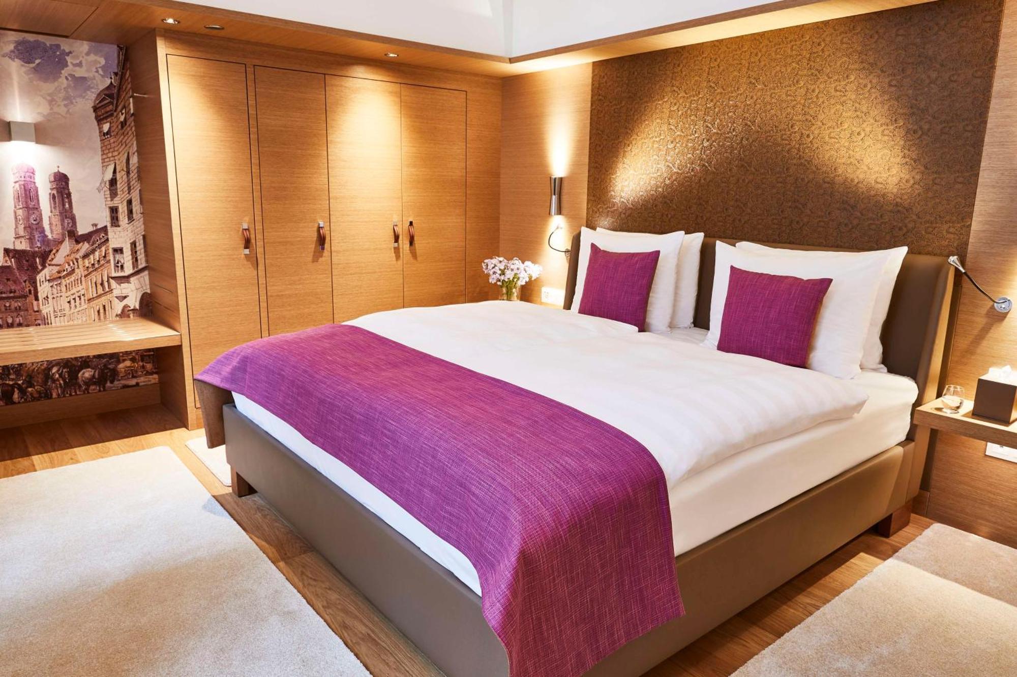 Vier Jahreszeiten Kempinski Muenchen Esterno foto A typical bedroom
